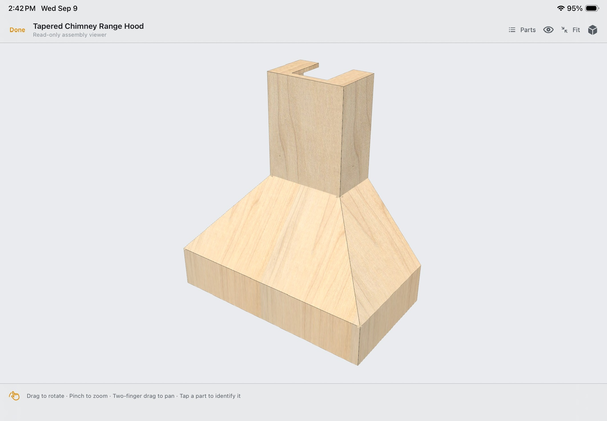 A tapered wooden chimney range hood in Casework’s assembly viewer